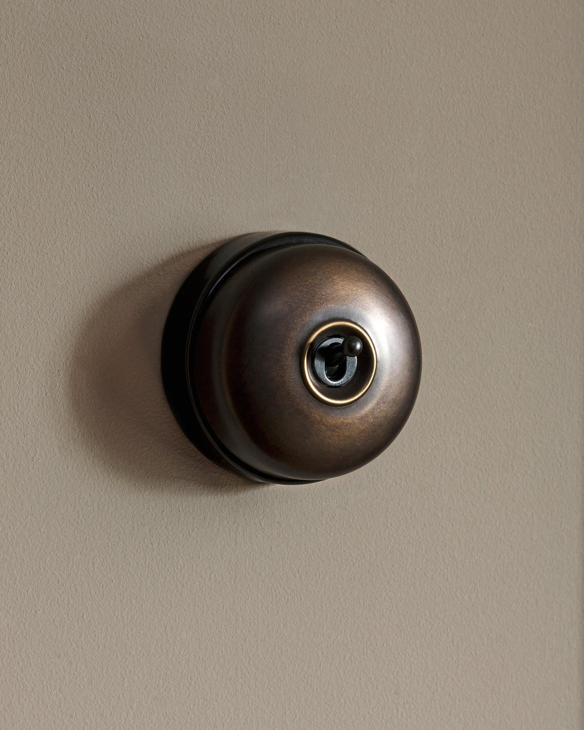 The Dolly Toggle Switch - Oxidised Brass, Black Base, Single Way Retract TEST
