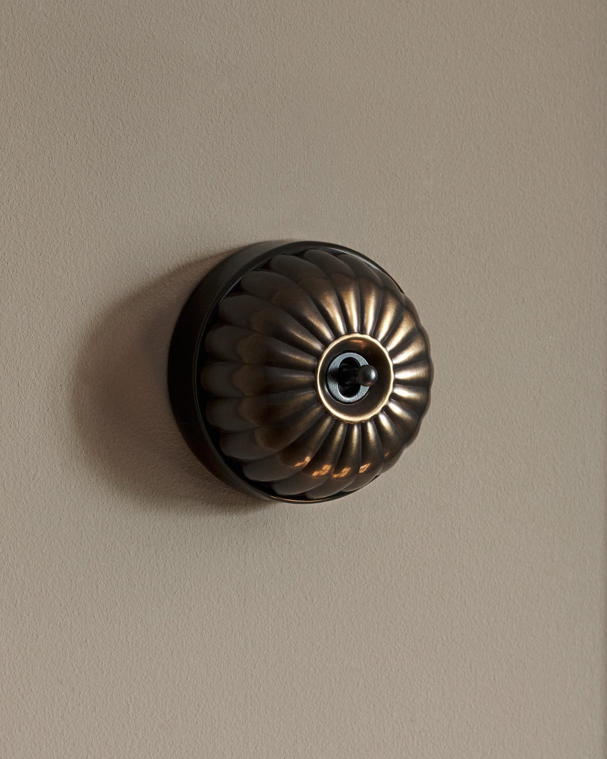 The Jelly Toggle Switch - Oxidised Brass, Black Base, Retract to Centre TEST