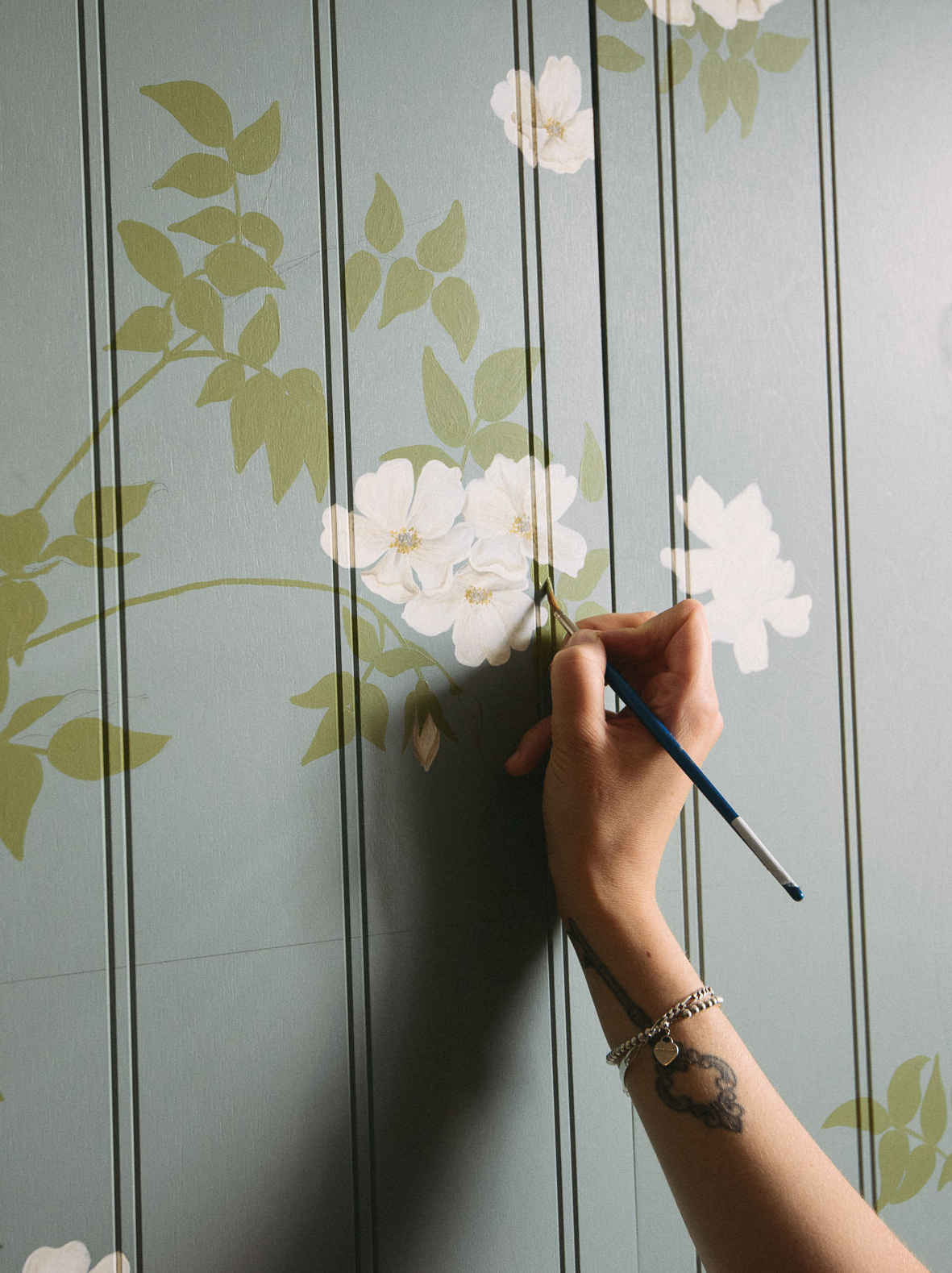 Our in-house Decorative Artist, Rosie, meticulously hand-paints each and every leaf and bloom.