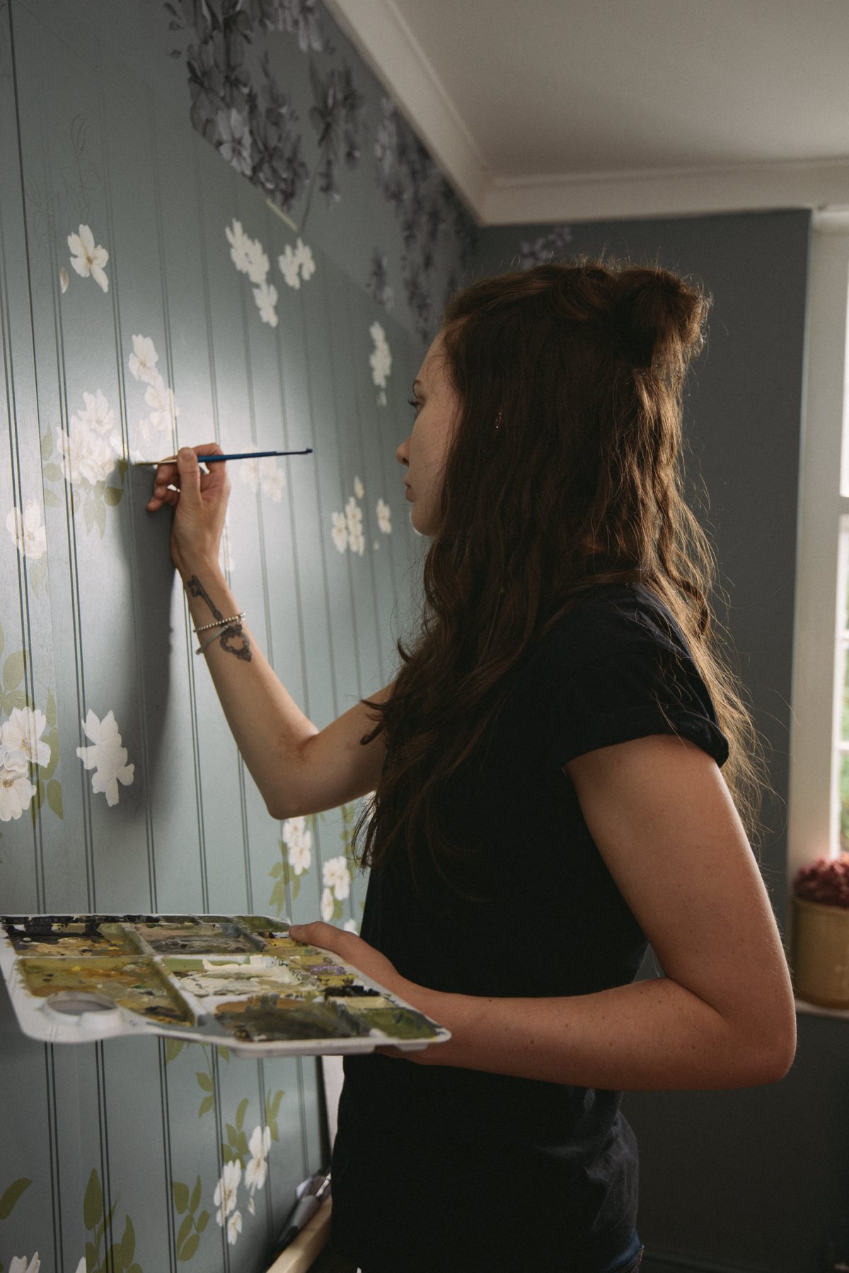 The talented and lovely Rosie hand-paints each design onto these tongue and groove backboard before the cabinet is constructed.