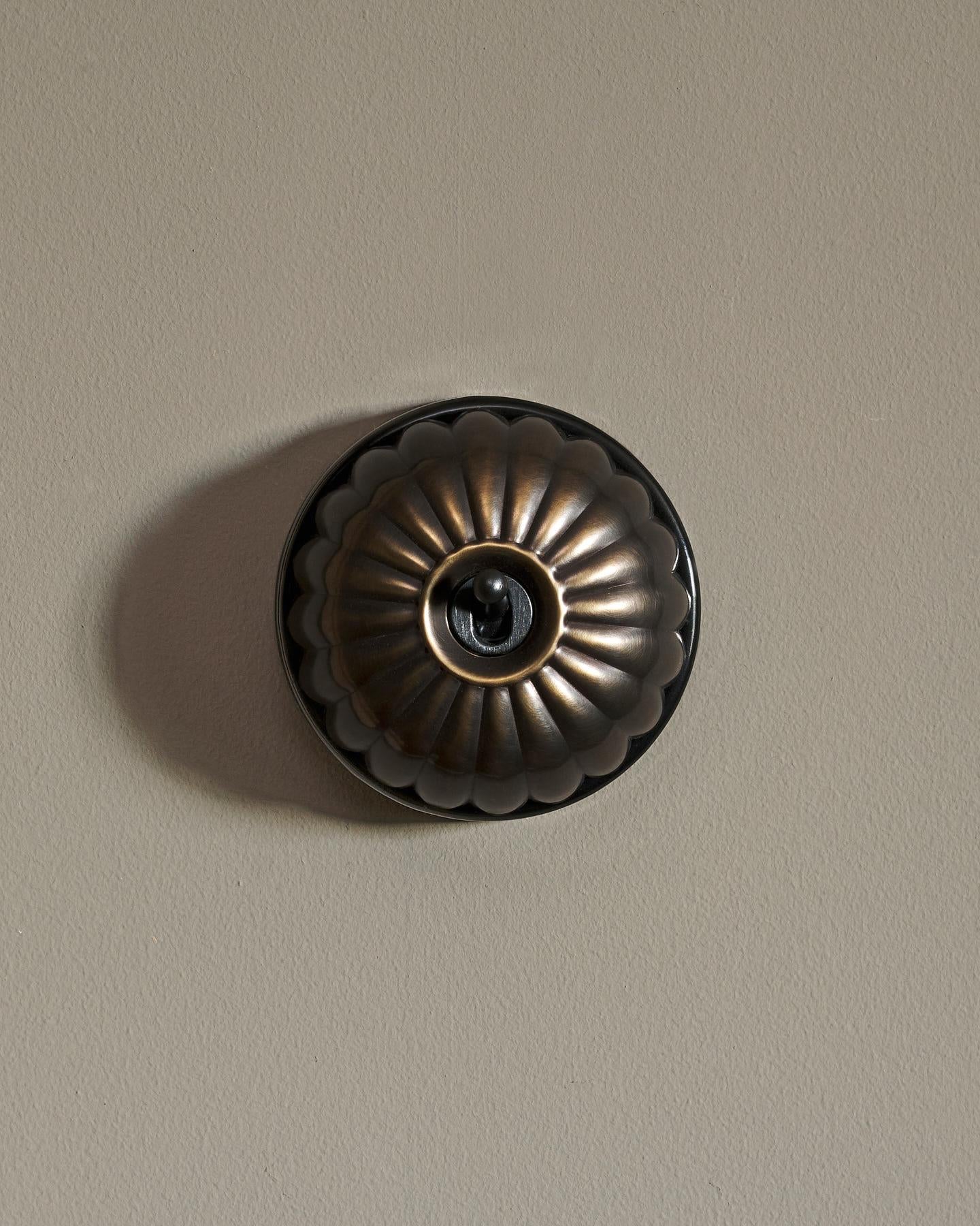 The Jelly Toggle Switch - Oxidised Brass, Black Base, Single Way Retract