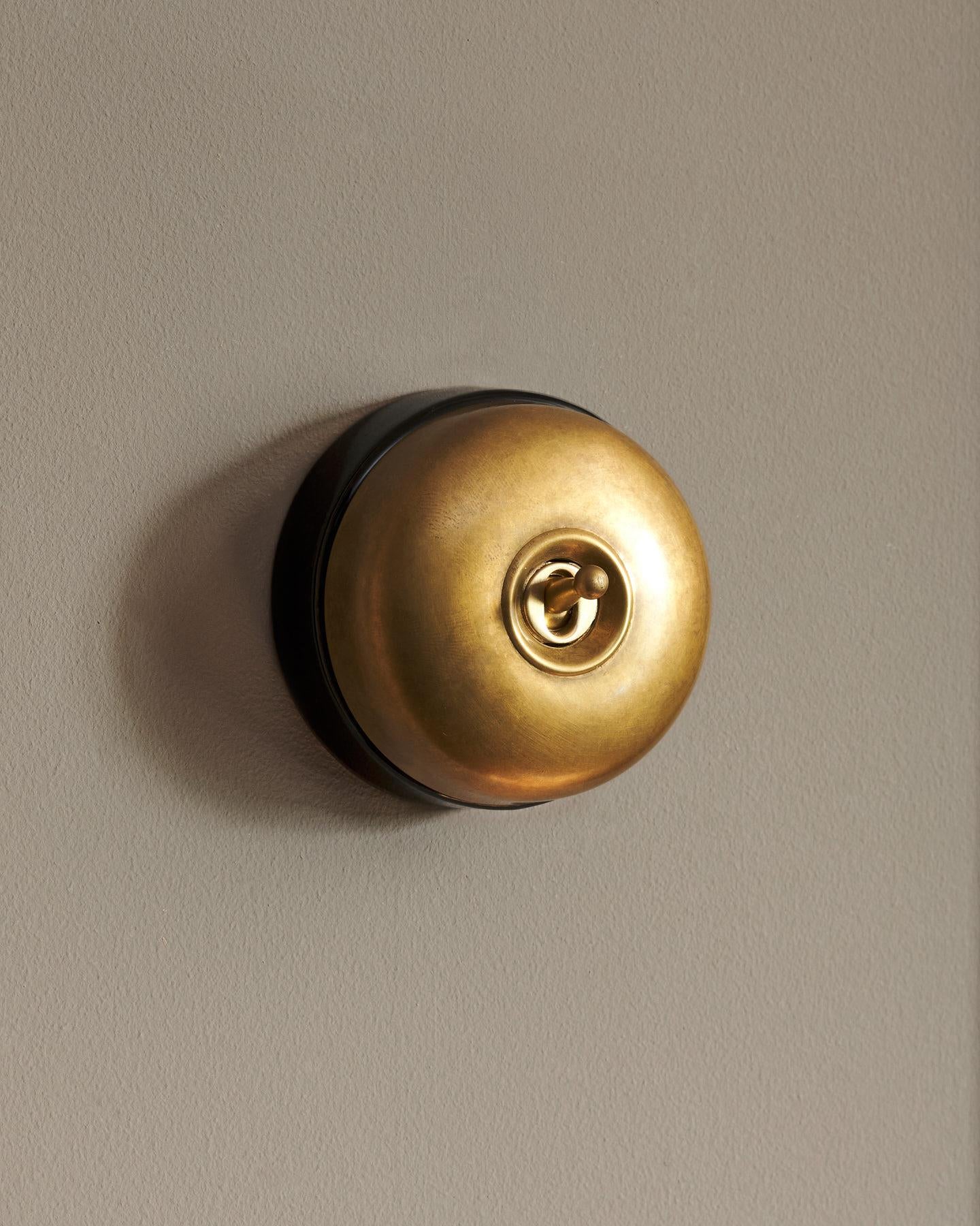 The Dolly Toggle Switch - Aged Brass, Black Base, Intermediate