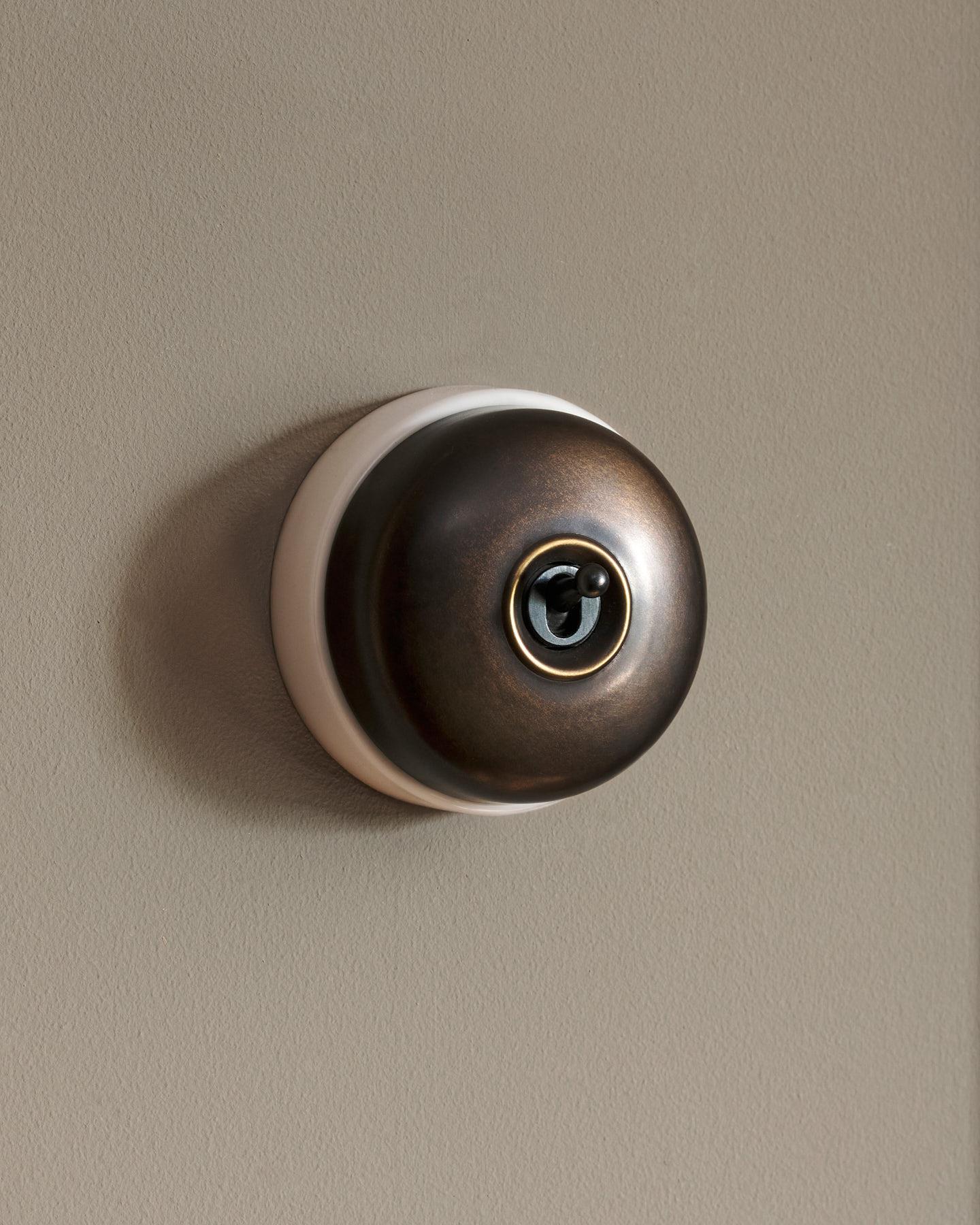 The Dolly Toggle Switch - Oxidised Brass, White Base, 2 Way