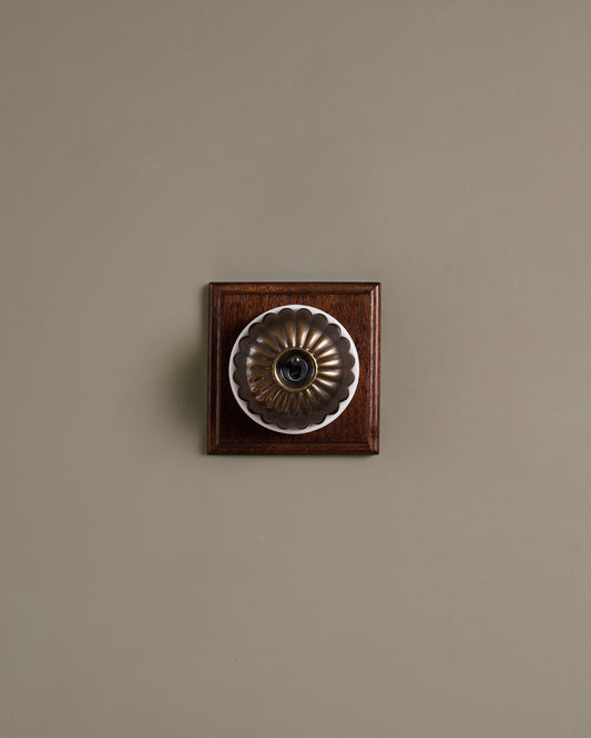 The Jelly Toggle Switch (1 Gang & Mahogany Finish Pattress) - Oxidised Brass with White Base.