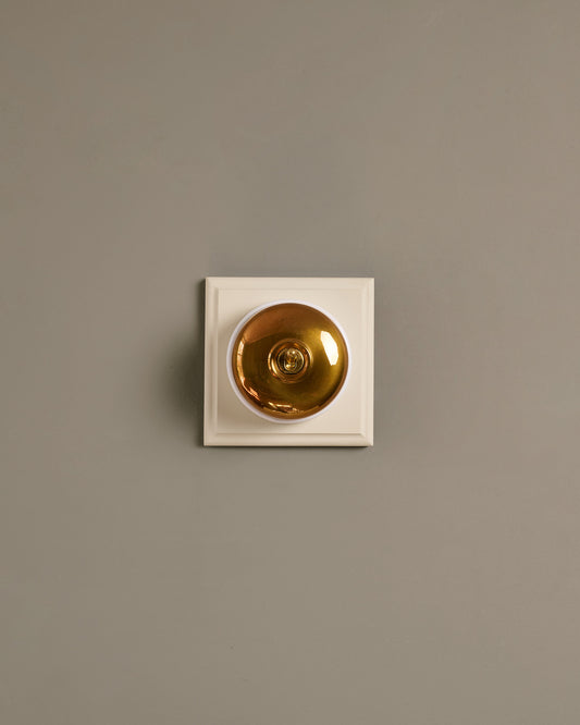 The Dolly Toggle Switch (1 Gang & Primed Maple Pattress) - Heirloom Brass with White Base.