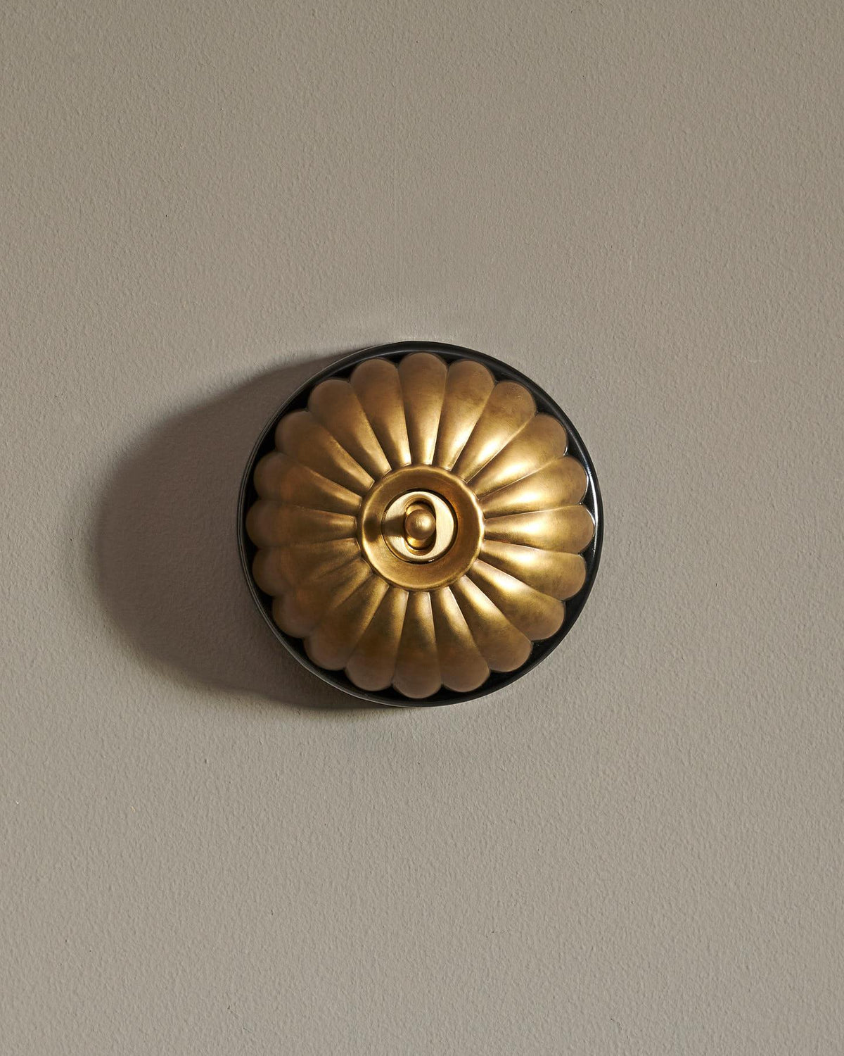 The Jelly Toggle Switch - Aged Brass, Black Base, Retract to Centre TEST