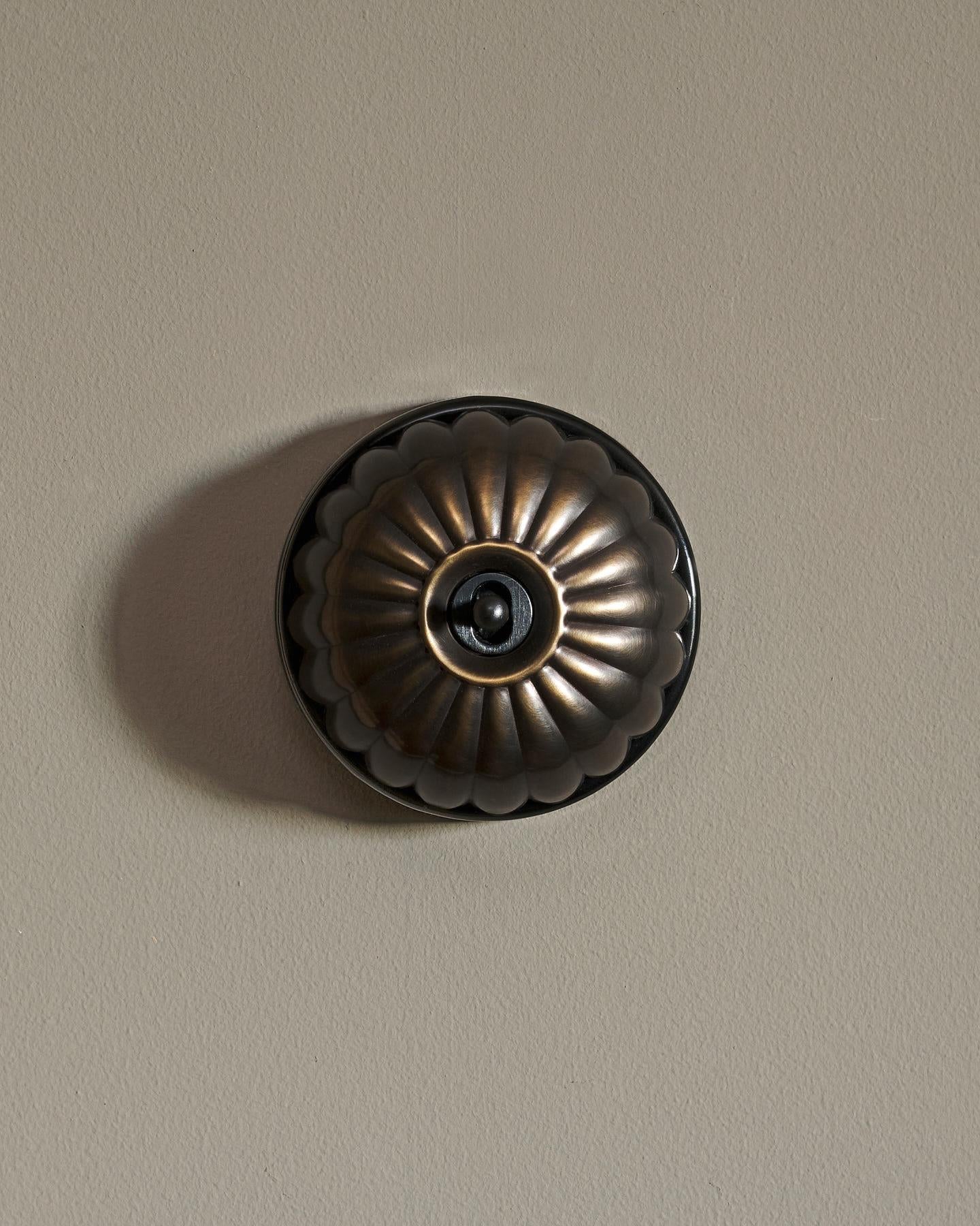The Jelly Toggle Switch - Oxidised Brass, Black Base, Retract to Centre