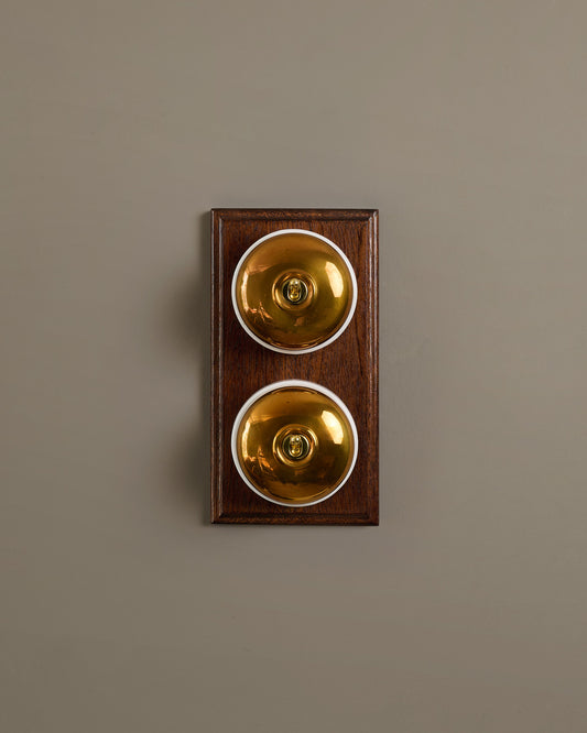 The Dolly Toggle Switch (2 Gang & Mahogany Finish Pattress) - Heirloom Brass with White Base.
