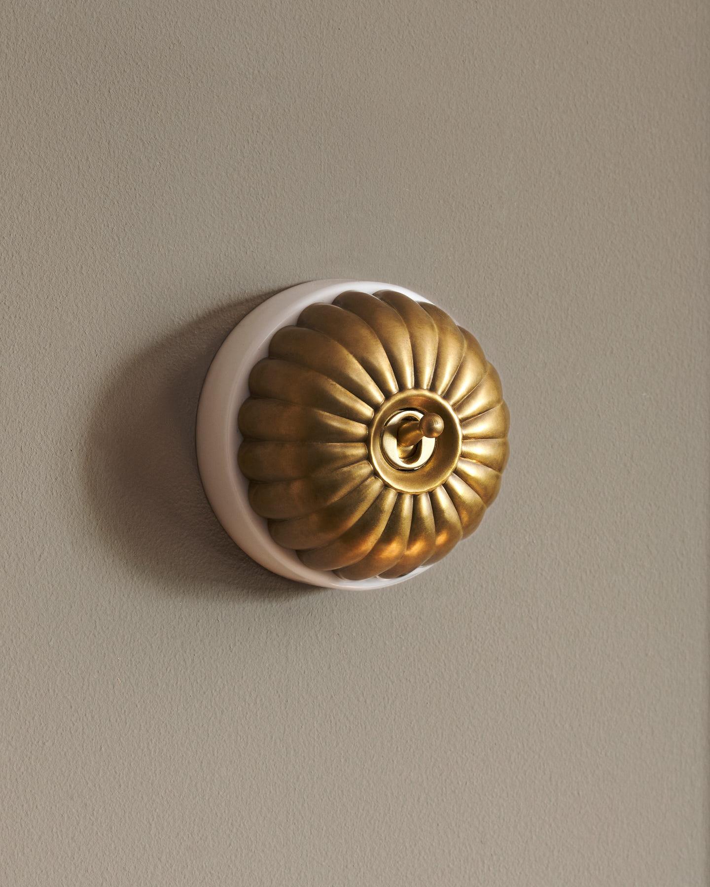 The Jelly Toggle Switch - Aged Brass, White Base, Intermediate