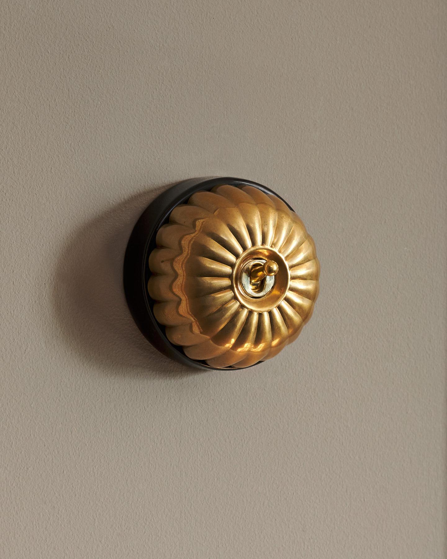 The Jelly Toggle Switch - Heirloom Brass, Black Base, Single Way Retract