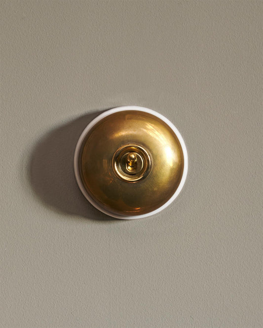 The Dolly Toggle Switch - Heirloom Brass, White Base, Single Way Retract