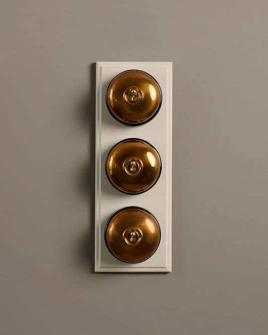 The Dolly Toggle Switch (3 Gang & Primed Maple Pattress) - Heirloom Brass with Black Base.
