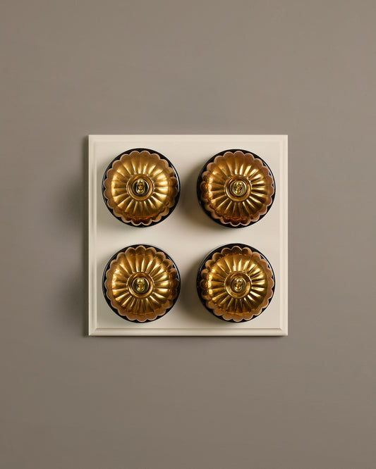 The Jelly Toggle Switch (4 Gang Bank & Primed Maple Pattress) - Heirloom Brass with Black Base.