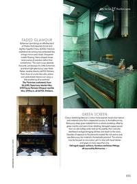 A page of a magazine. There are two images on the page, one on the bottom left showing a double bathroom washstand painted black with brown tiles behind. The other image is on the top right of the page, it shows a very green kitchen. There are two blocks of text on the page.
