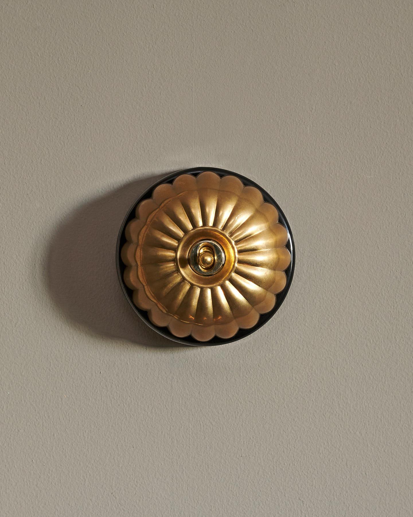 The Jelly Toggle Switch - Heirloom Brass, Black Base, Retract to Centre