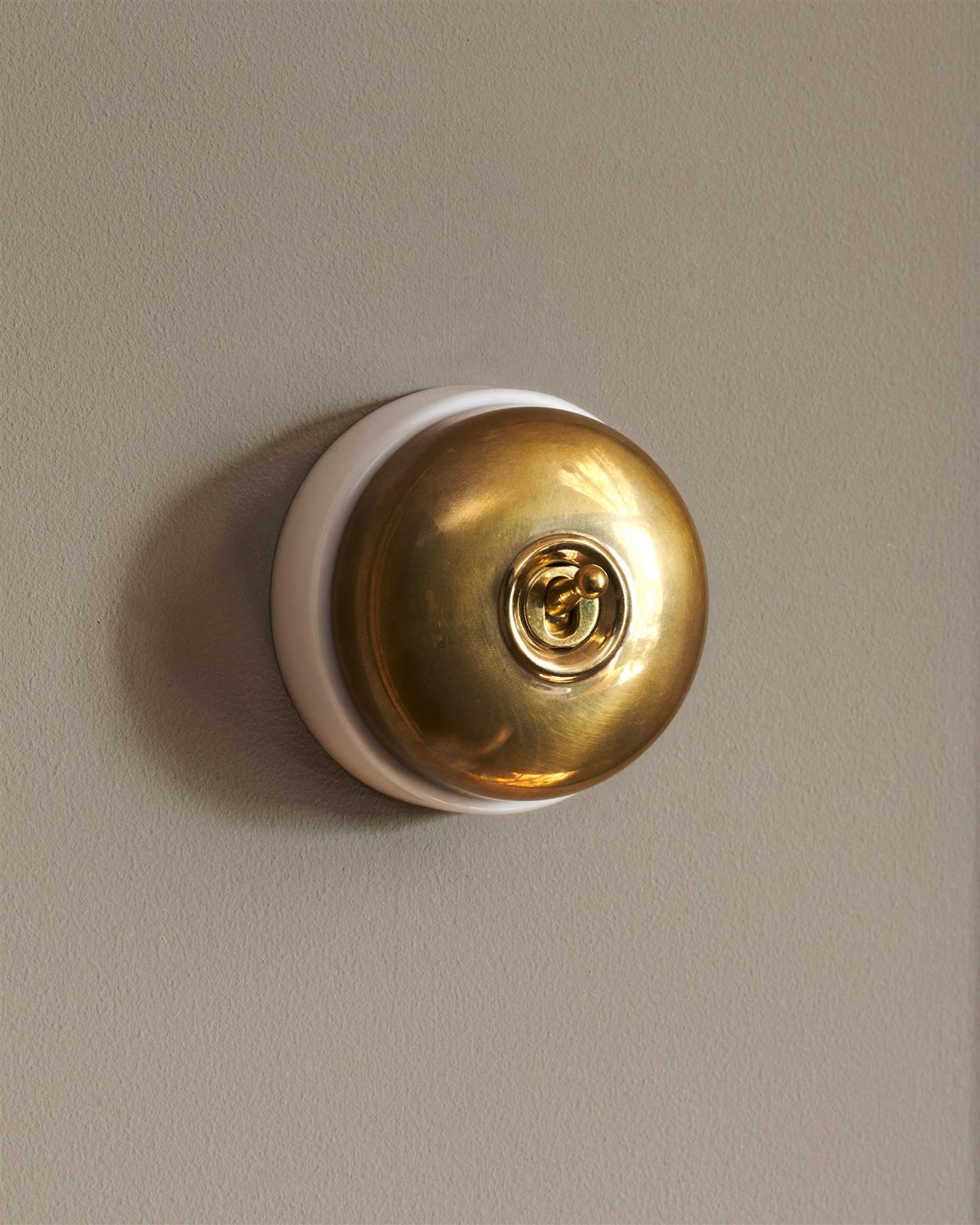 The Dolly Toggle Switch - Heirloom Brass, White Base, Single Way Retract TEST