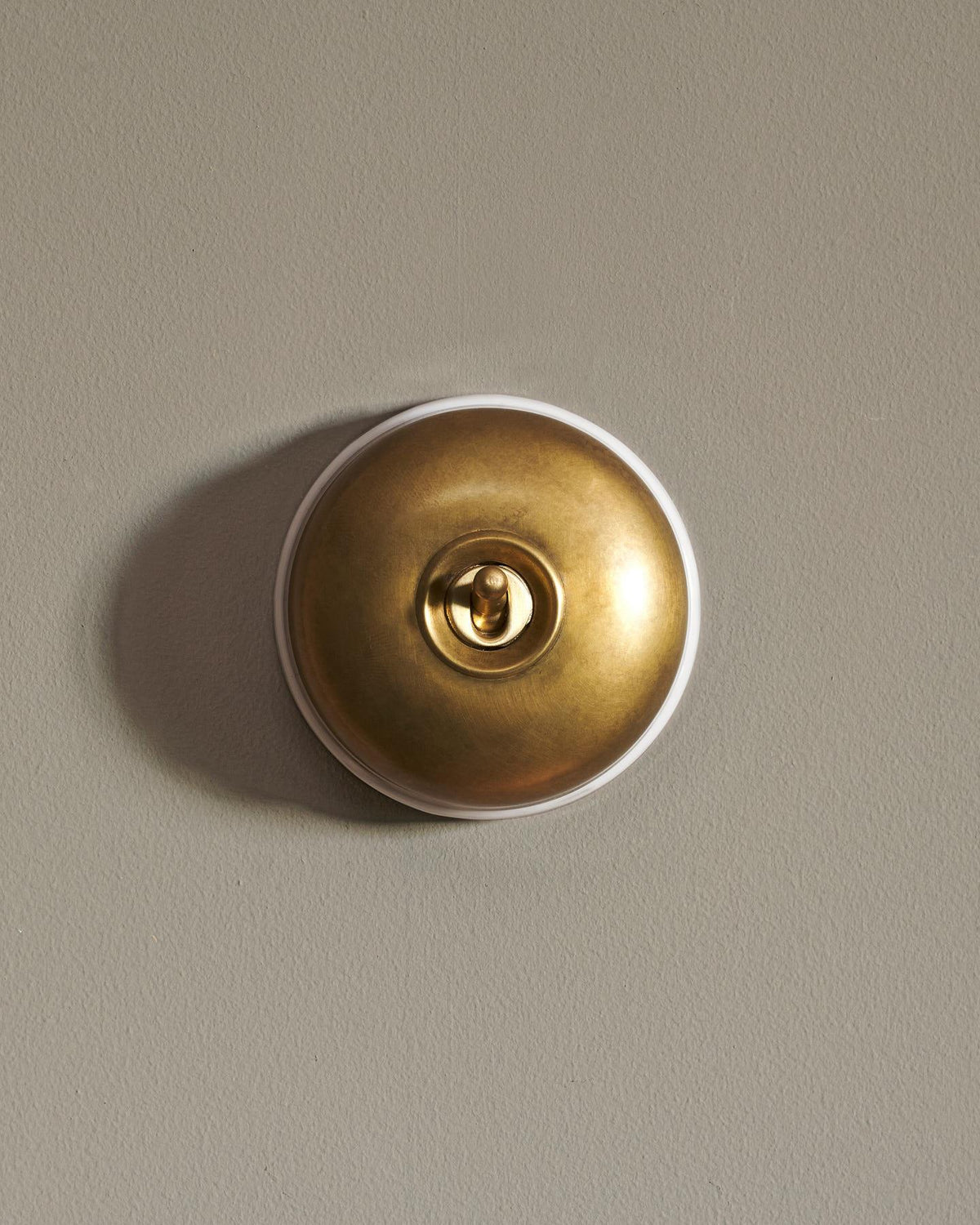 The Dolly Toggle Switch - Aged Brass, White Base, Single Way Retract TEST