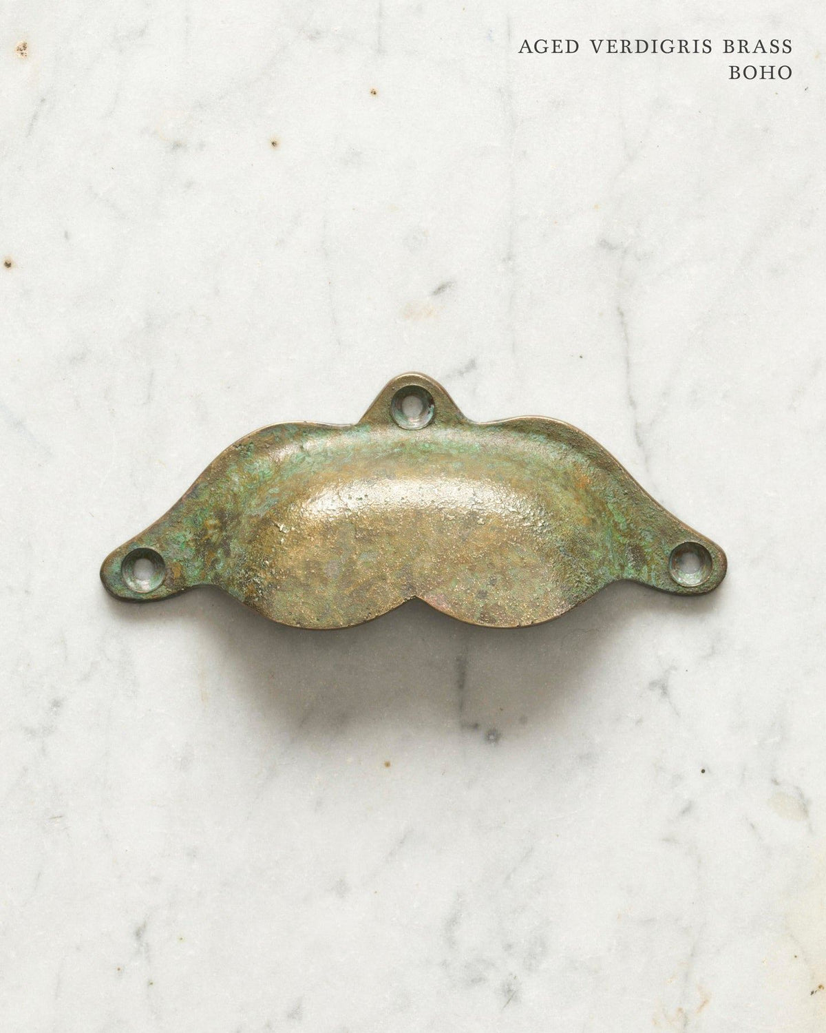 Two bohemian-style cup handles for a kitchen cupboard or drawer with an aged verdigris brass finish. There is a large and a small size. TEST