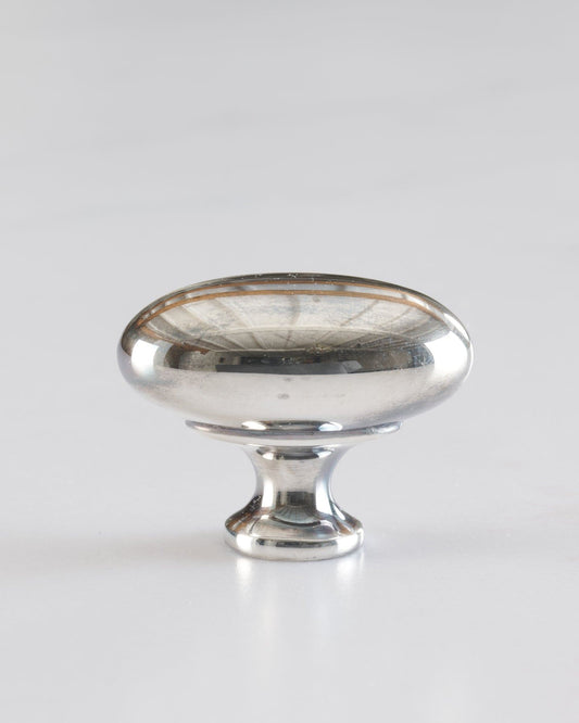 A 'Large' oval-shaped knob for a kitchen cupboard or drawer with a tarnished silver finish.