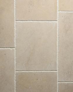 An overhead view of Vintage Bronze Limestone flooring.