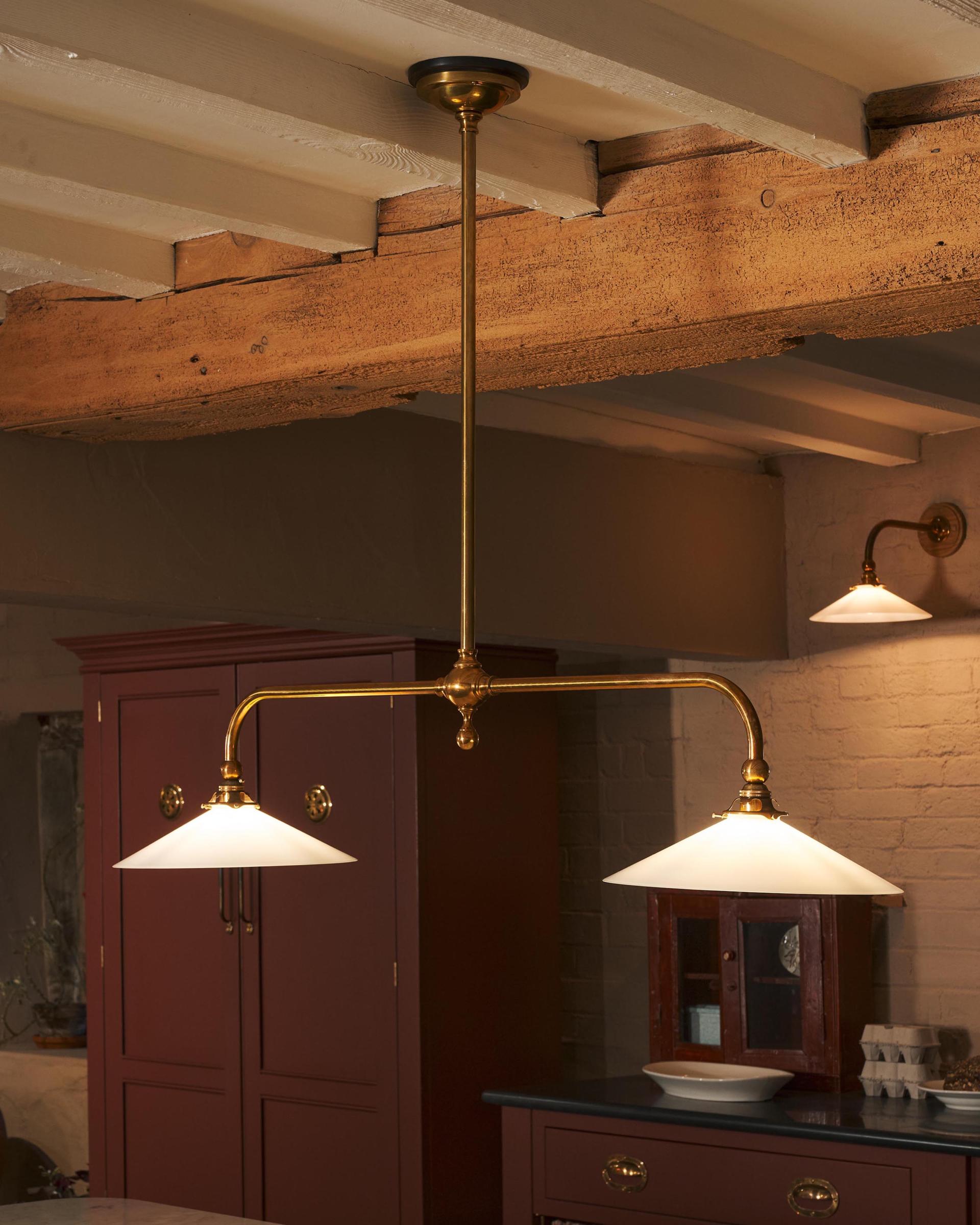 The Milk Glass Gaselier Light in our maroon plum red Heirloom kitchen display.