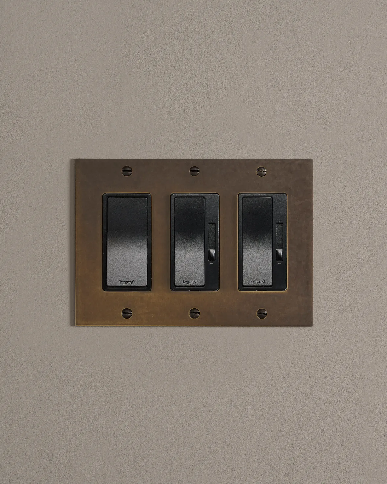 a front on shot of a mixed module on an oxidised brass plate.