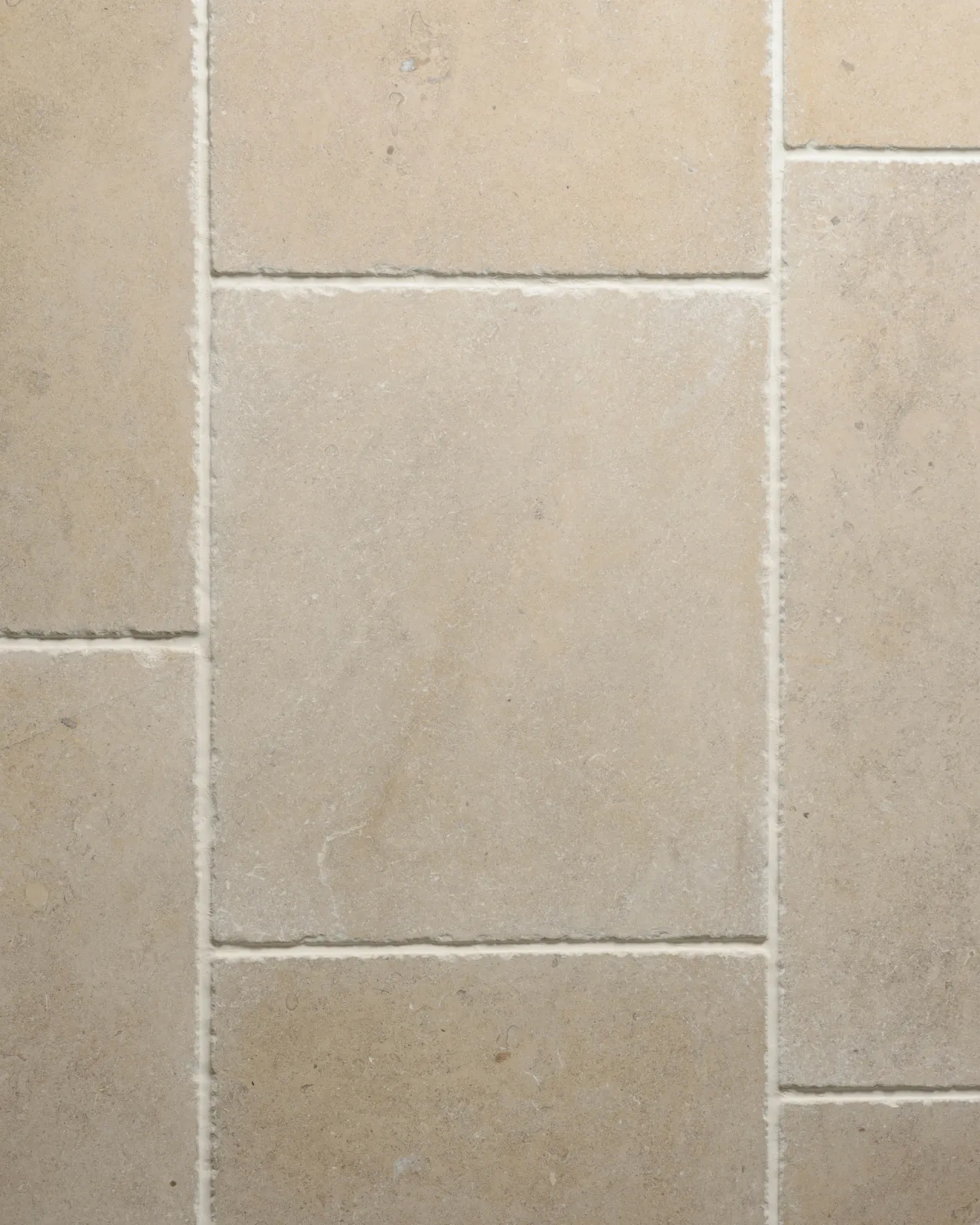 An overhead view of Vintage Bronze Limestone flooring.