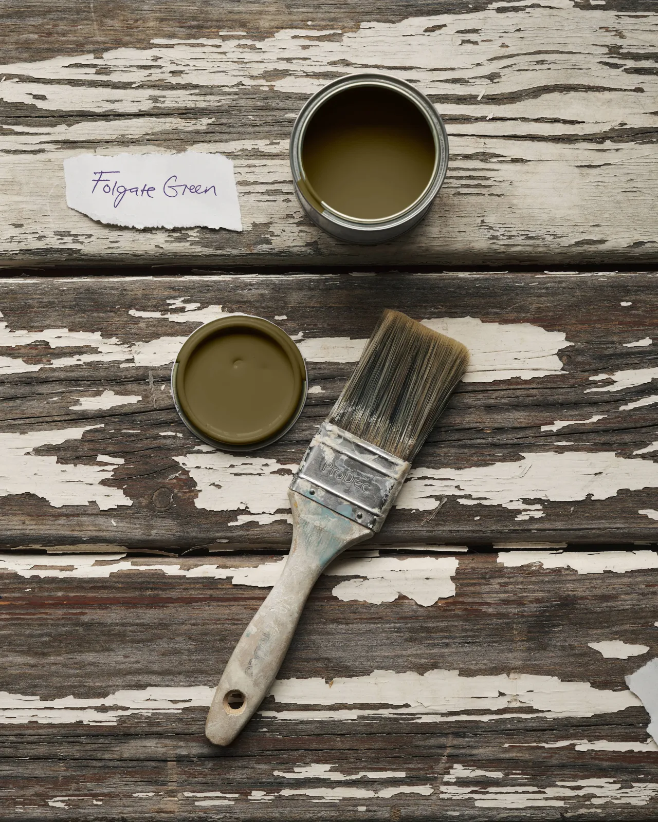 a sample pot of a yellow-ish dark green